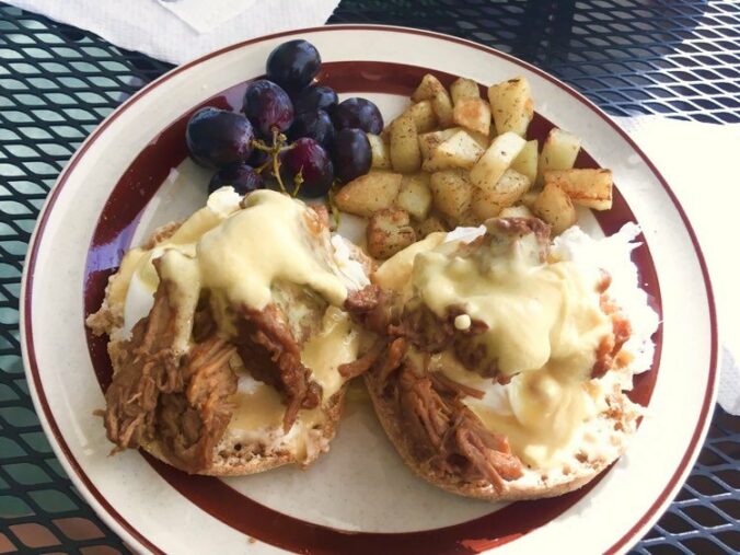 Pulled Pork Benny with Homemade Hollandaise, Hashbrowns, and Local